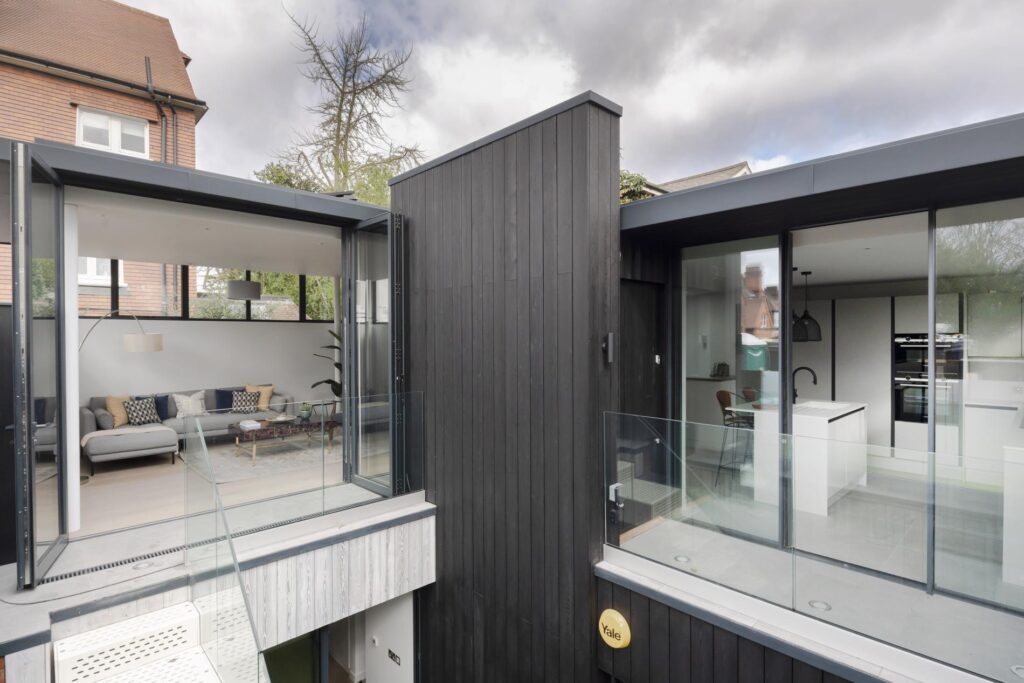 impressive architecturally designed property. Full glass walls looking into kitchen and living room